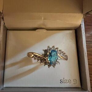 Silver plated ring light blue stone